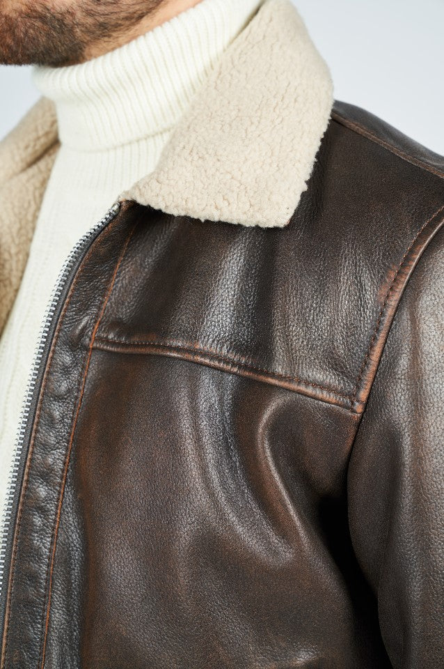 giacca in pelle foderata, fascia elastica, cerniera lampo a due direzioni, colletto foderato